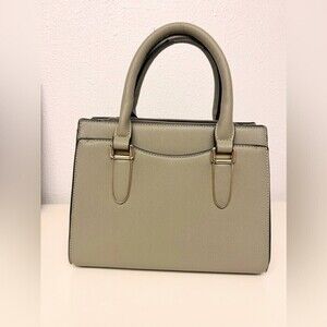 Women's‎ green bag.